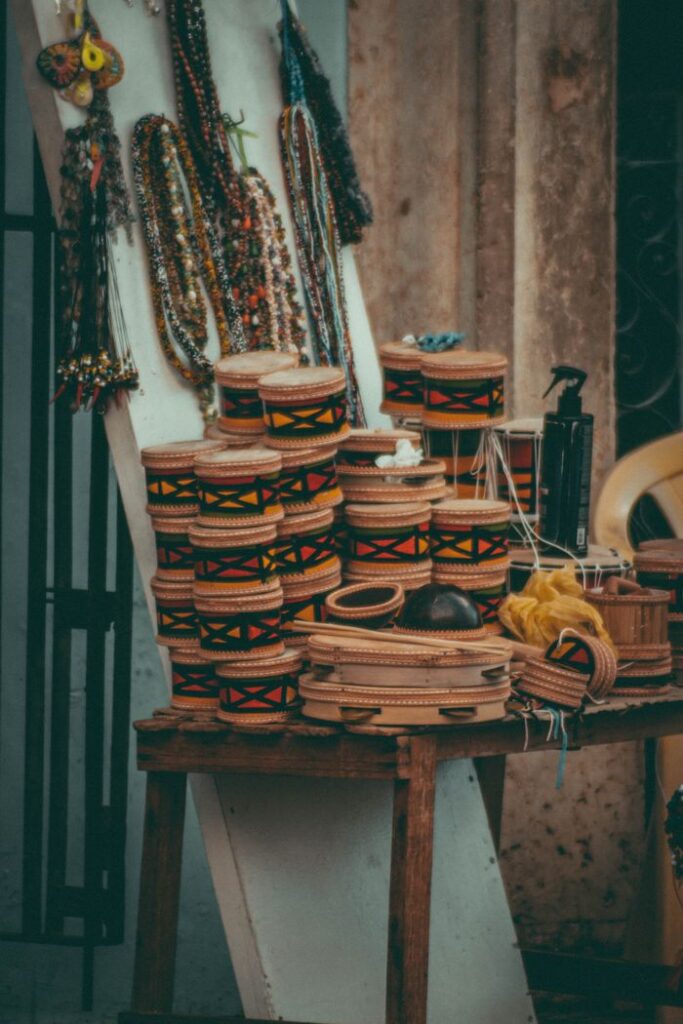 Vibrant handmade baskets and beaded jewelry on display showcase artisan craftsmanship.